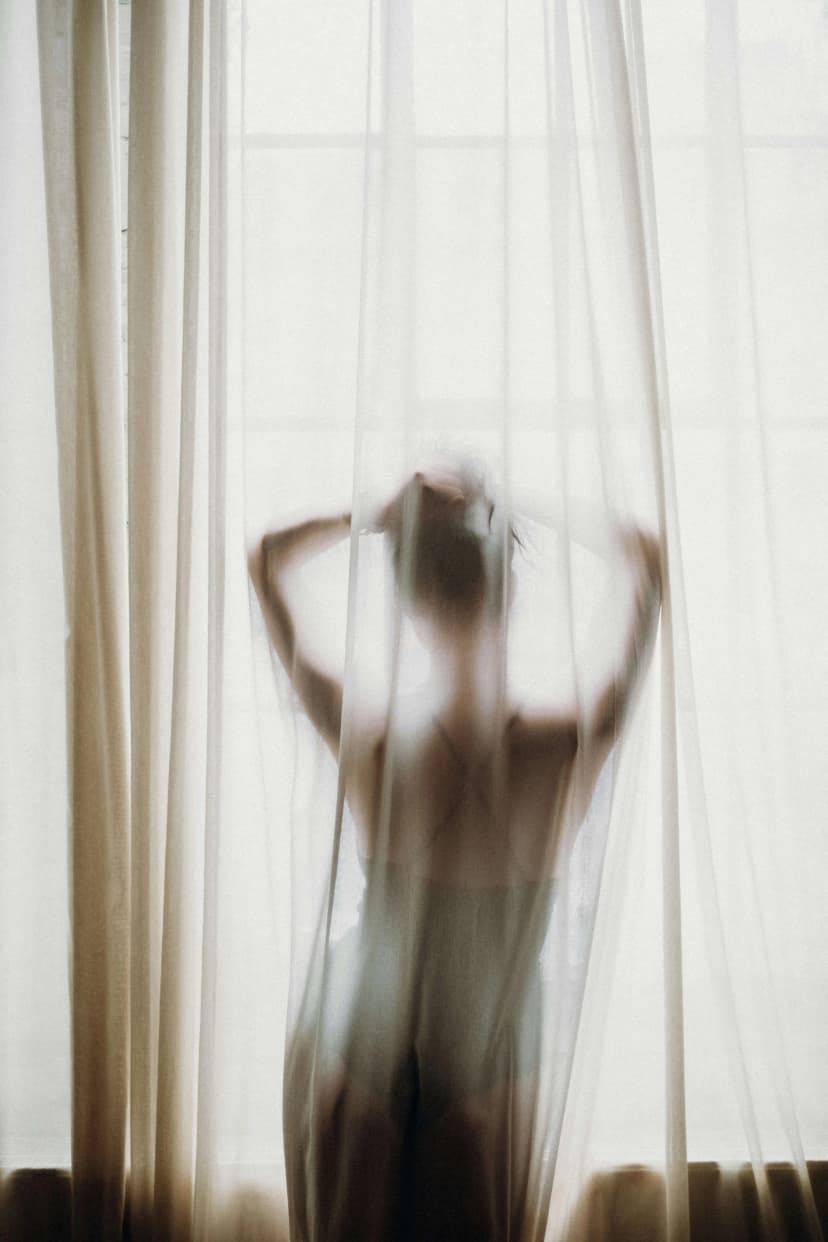Woman by Window
